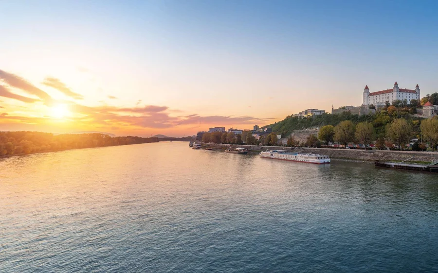 The Danube at sunset with Bratislava Castle on the far bank
