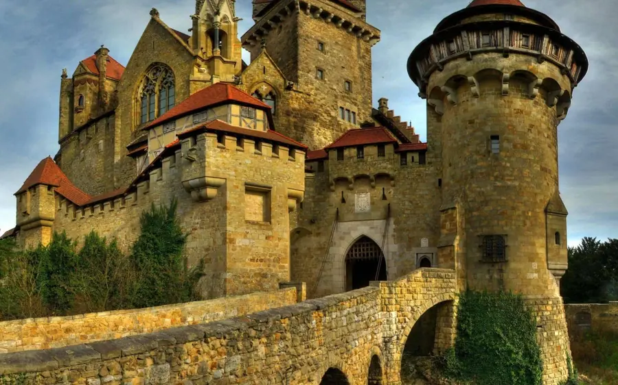 Stone towers and a bridge at the entrance of a medieval castle