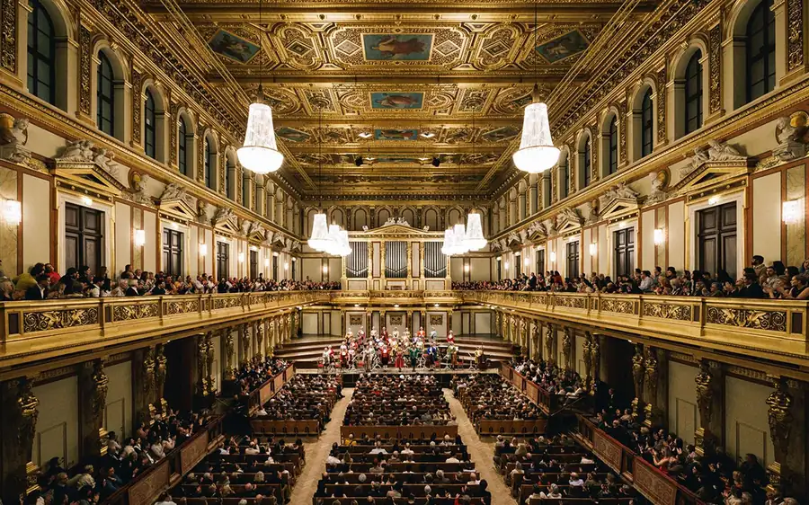 The gilded Golden Hall of the Musikverein filled with an audience