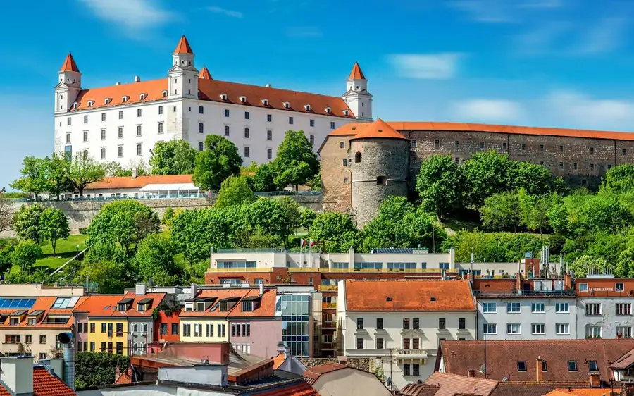 Bratislava Castle on its hill above the red roofs of the old town