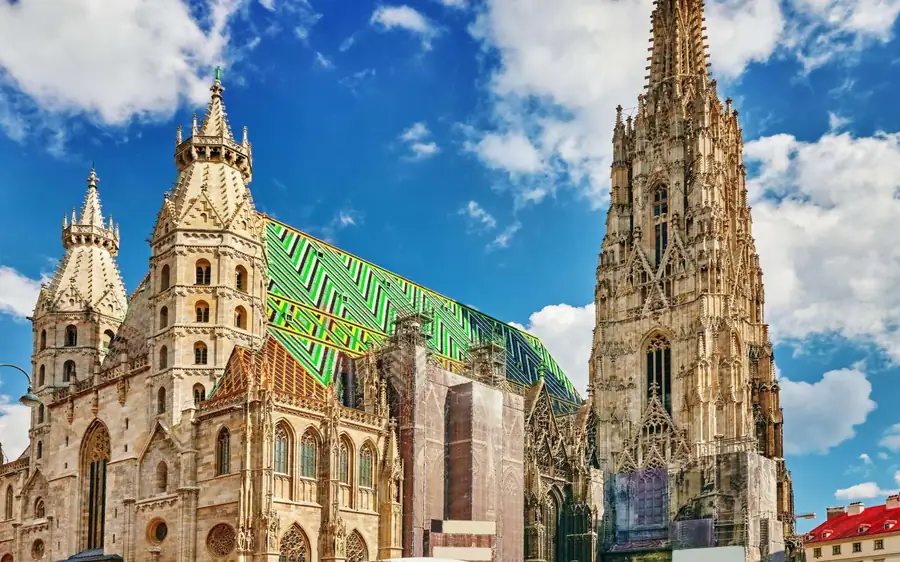 The Gothic spire and patterned tiled roof of St. Stephen’s Cathedral