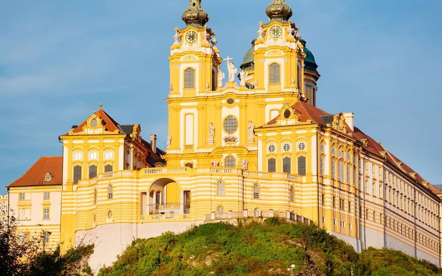 The yellow baroque towers of Melk Abbey on its hill